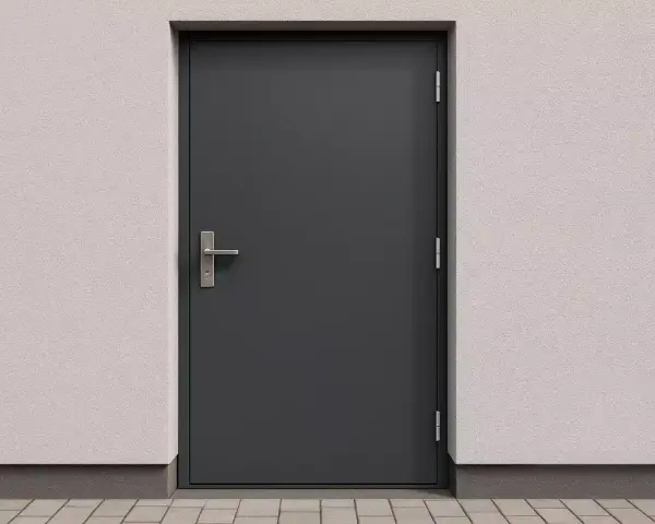 Solidne drzwi techniczne antracyt z metalowym uchwytem, osadzone w jasnej, chropowatej ścianie.